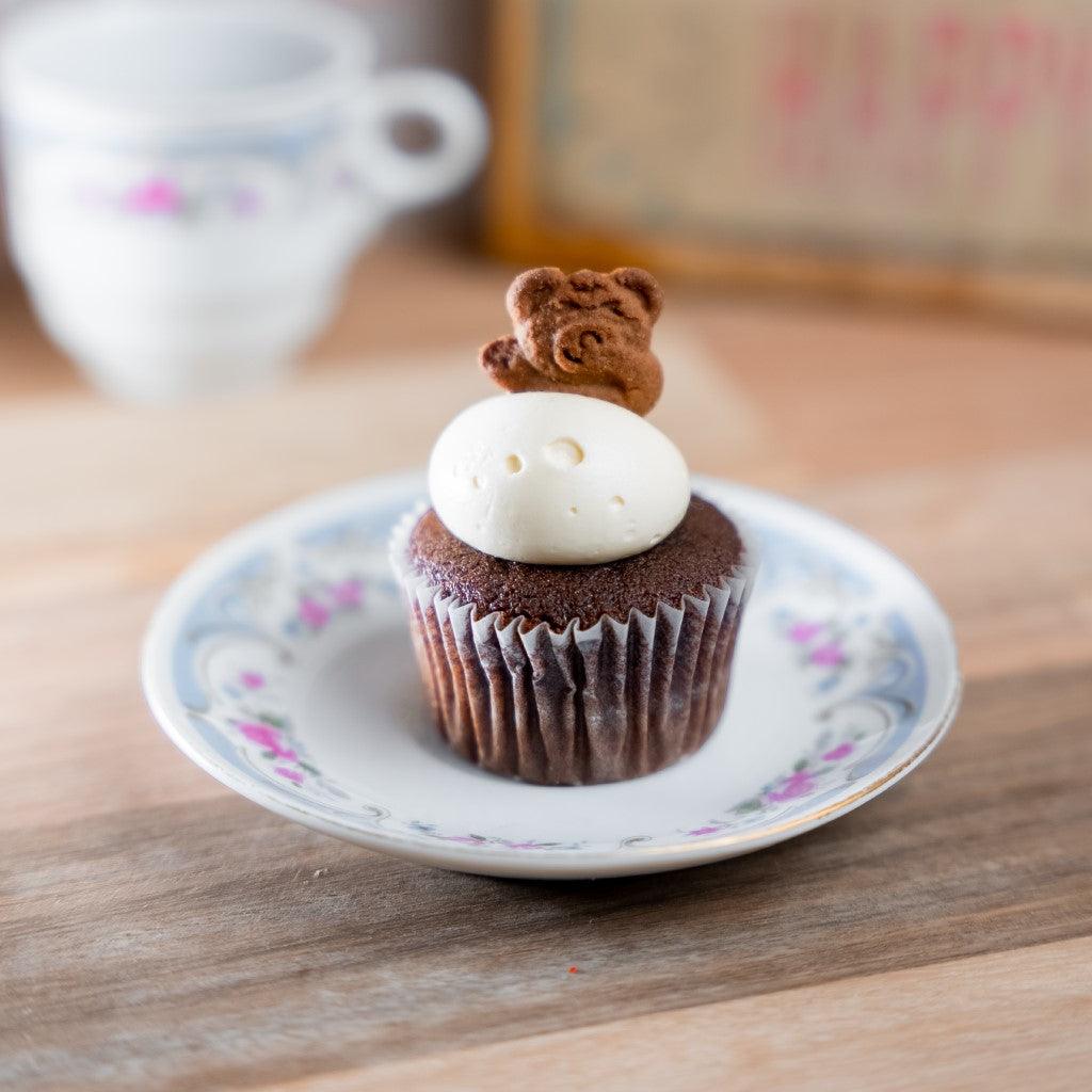 Tiny Teddy cupcake with chocolate frosting
